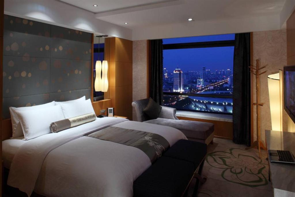 New City Garden Hotel Суджоу Стая снимка